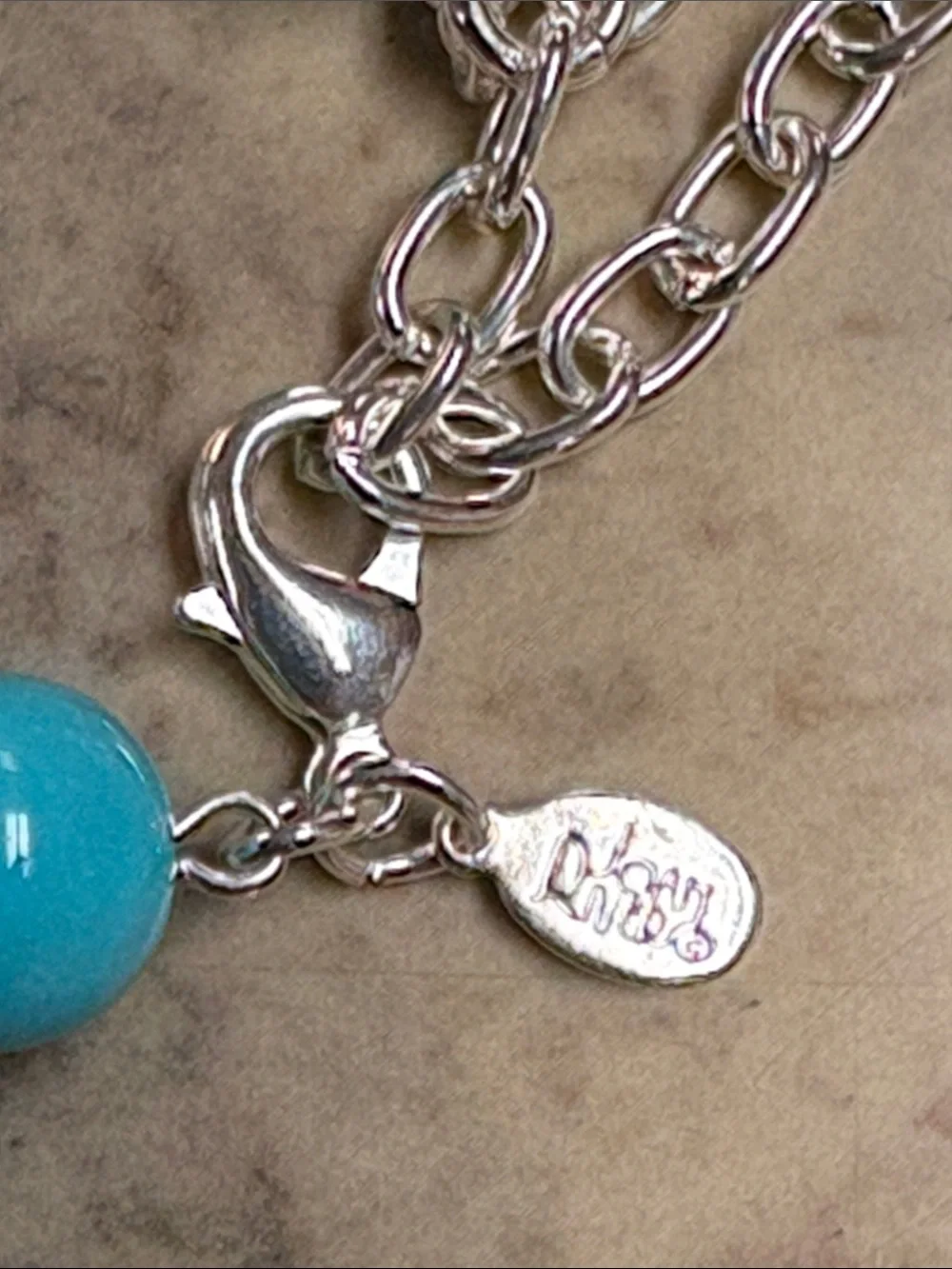 Joan Rivers vibrant turquoise